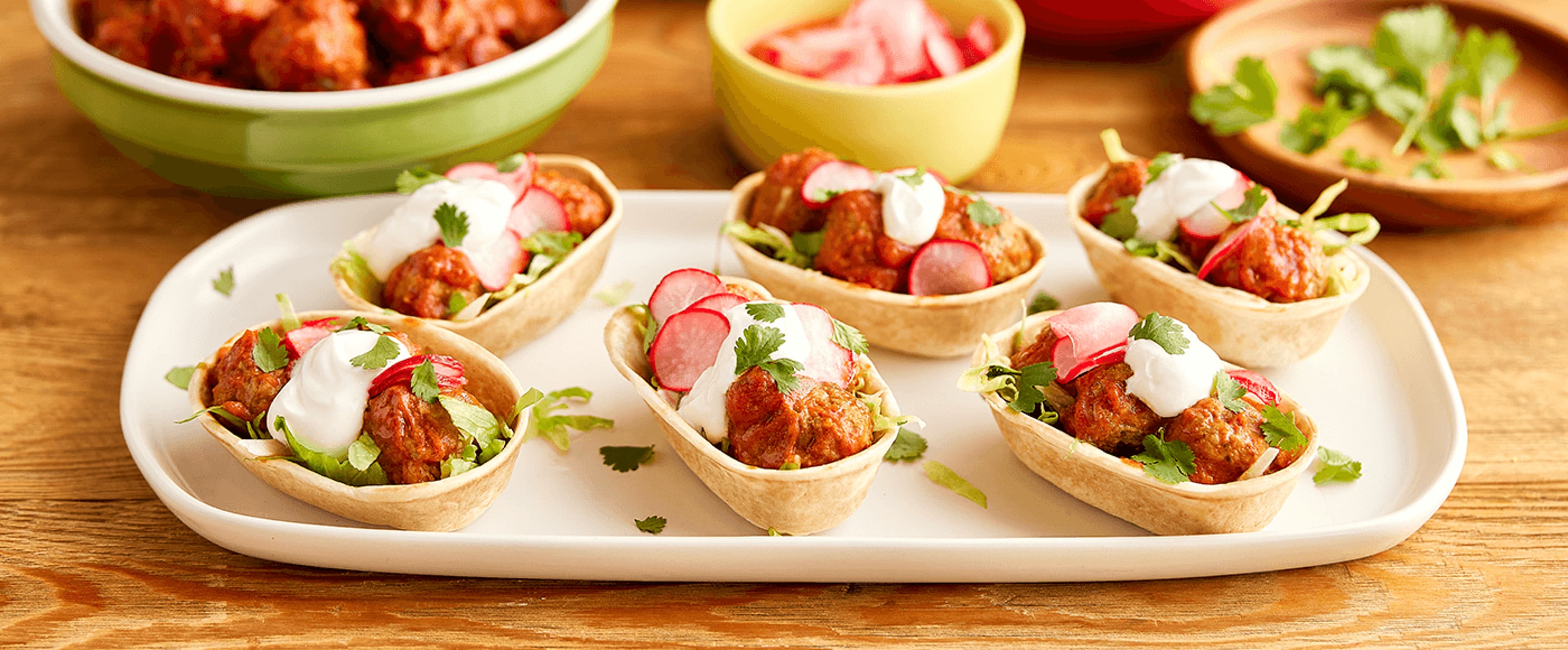 SLOW COOKER MINI CHILLI MEATBALLS IN MINI TORTILLA BOATS